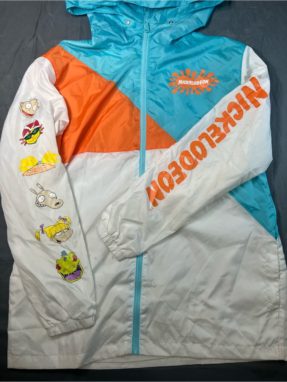 Y2K, Nickelodeon Teal, Orange & White Character Windbreaker.
